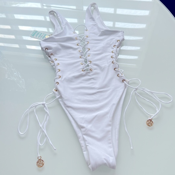 Luli Fama Open side one piece bodysuit color white size Small - Picture 16 of 16